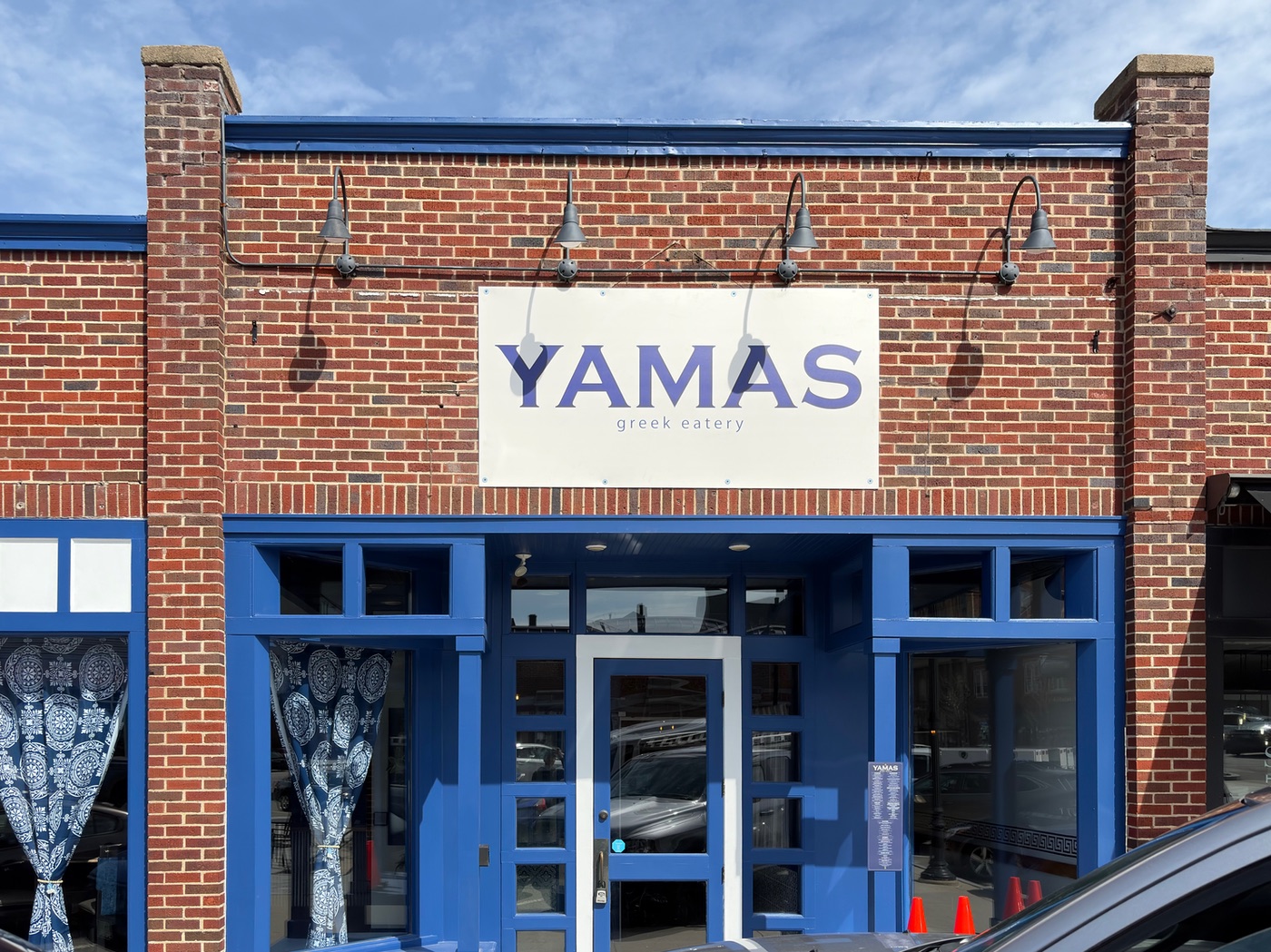 The Yamas Concord storefront with royal blue trim